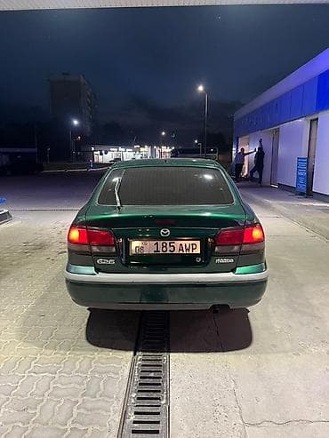 34 bwm: Mazda 626: 1998 г., 1.8 л, Механика, Бензин, Седан — 3