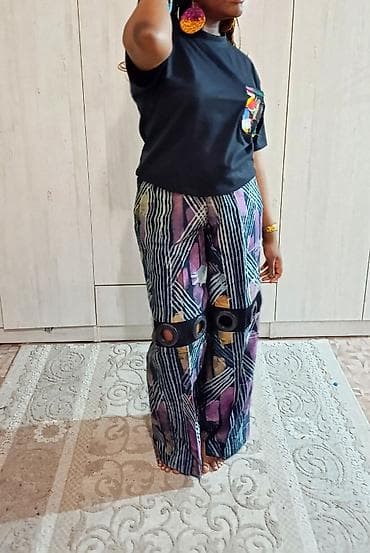 пит тарак: Стильный комплект: Брюки-палаццо с люверсами Яркий. Современный — 3