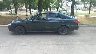 626: Mazda 626: 2001 г., 2 л, Механика, Бензин, Лифтбек — 4