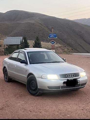 Audi A4: 1996 г., 1.8 л, Механика, Бензин, Седан