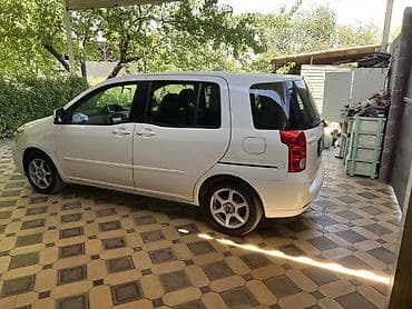 Транспорт: Toyota Raum: 2003 г., 1.5 л, Автомат, Бензин, Минивэн — 2
