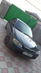 продаю или меняю на дом: Mazda 323: 2000 г., 1.6 л, Механика, Бензиновая, Седан — 8