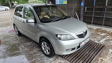 с моей доплатой: Mazda Demio: 2004 г., 1.3 л, Бензин — 2