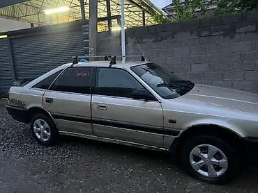 салон машины: Mazda 626: 1989 г., 2 л, Механика, Бензин, Седан — 2