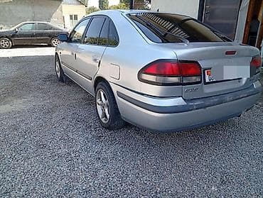 devo tiko: Mazda 626: 1998 г., 1.8 л, Механика, Бензин, Хэтчбэк — 4