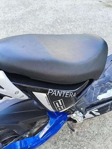 перья: Скутер Pantera. - Яркая передняя оптика: две основные фары — 9
