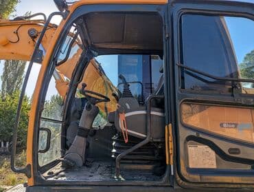 разноширокая резина: Экскаватор, Hyundai, 2012 г., Колесный — 5