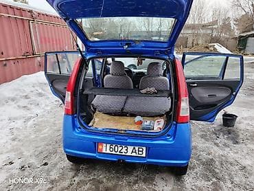 bmw 39: Daihatsu Cuore: 2003 г., Механика, Хэтчбэк — 4