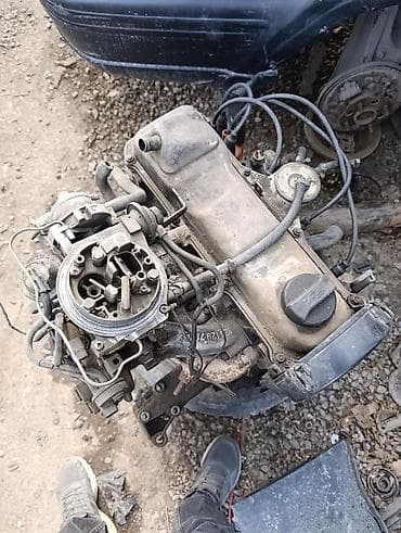 Двигатель карбюраторный в сборе.
Audi об 1.8