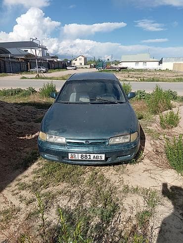 Транспорт: Mazda 626: 1993 г., 2.2 л, Механика, Бензин, Седан — 3