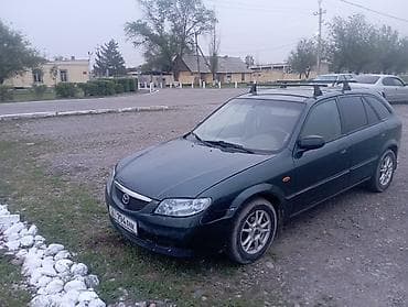 Mazda 323: 2002 г., 1.3 л, Механика, Бензин, Универсал