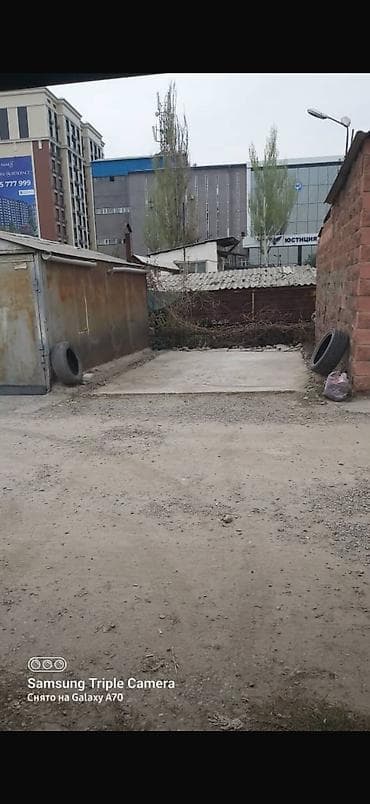 Место для автомобиля, площадью 21,7м. Длина - 6,2 м. Ширина - 3,5м at lalafo.kg Место для автомобиля, площадью 21,7м. Длина - 6,2 м. Ширина - 3,5м