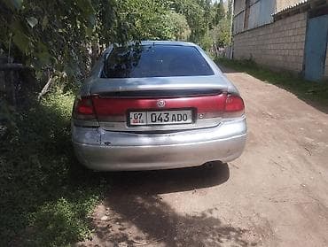 Продажа авто: Mazda Lantis: 1994 г., 2 л, Механика, Бензин, Хэтчбэк — 5
