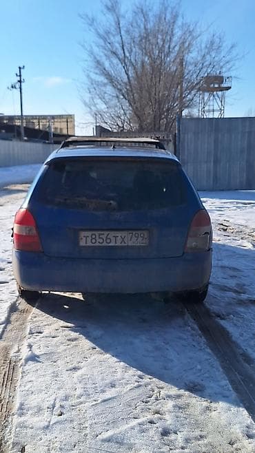 Mazda 323: 2001 г., 1.5 л, Механика, Бензин, Универсал