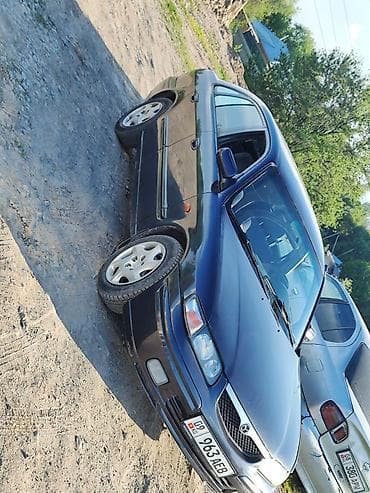 mazda demio1: Mazda Capella: 1997 г., 2 л, Механика, Бензин, Хэтчбэк — 5