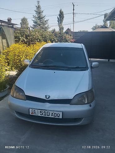 крыло калдина: Toyota Platz: 2001 г., Седан — 3
