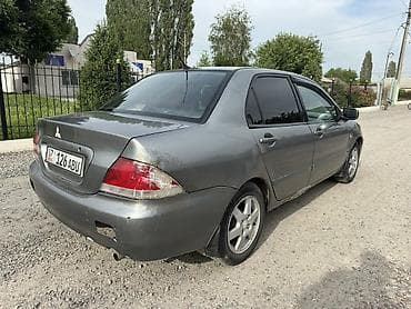аудио усилитель: Mitsubishi Lancer: 2006 г., 1.6 л, Механика, Бензин, Седан — 6