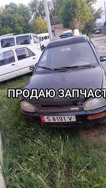 накладка на фит: Mazda 323: 1990 г., Механика, Бензин, Седан — 1