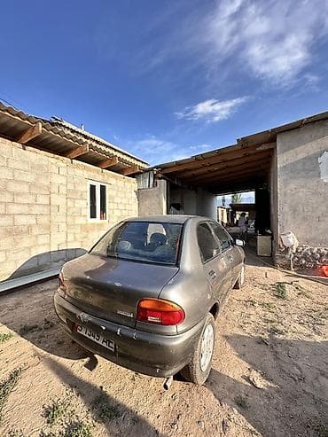 Унаа: Daewoo Nexia: 1991 г., 1.4 л, Кол менен иштөөчү, Бензин, Седан — 5