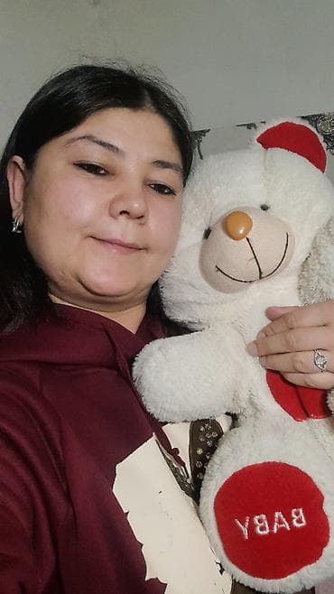 Мягкая игрушка — плюшевый медвежонок белого цвета с вышивкой BABY на