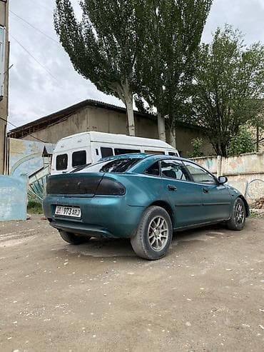 legacy bm: Mazda Lantis: 1994 г., 1.6 л, Механика, Бензин, Седан — 4