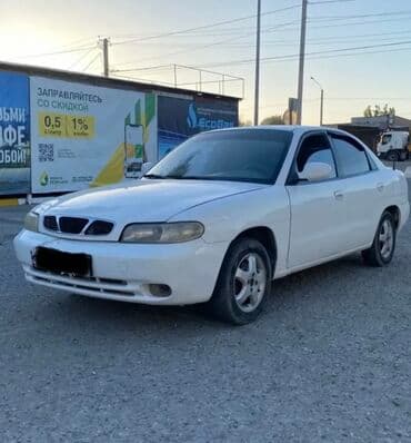 полик нексия 2: Daewoo Nubira: 1998 г., 1.5 л, Механика, Бензиновая, Седан — 3