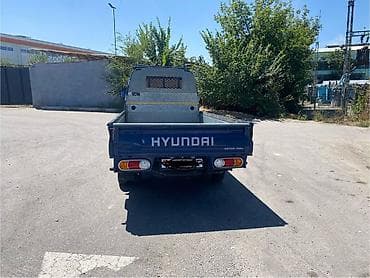 Hyundai Porter II (Porter), синий бортовой малотоннажный грузовик — 4