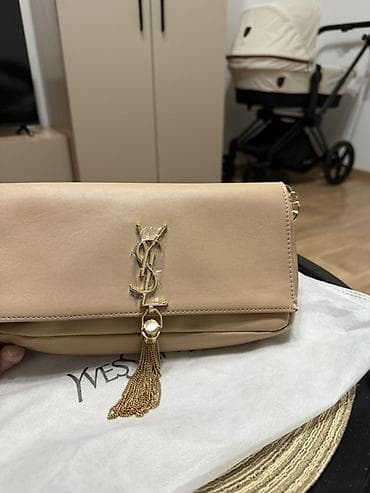 Сумка-клатч Yves Saint Laurent, бежевого цвета. - Материал: гладкая
