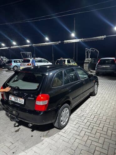 полик нексия 2: Mazda 323: 2001 г., 1.6 л, Механика, Бензиновая, Седан — 5