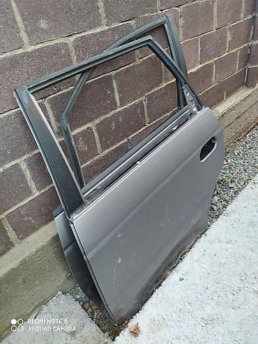 Двери Odyssey RA6 . Есть вмятина снизу. Левая сторона задний at lalafo.kg Двери Odyssey RA6 . Есть вмятина снизу. Левая сторона задний