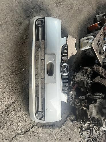 демио зеркало: Бампер Mazda, Б/у, Оригинал — 1