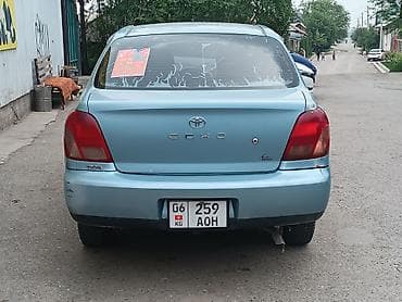 авто выхлоп: Toyota Echo: 2000 г., 1.5 л, Механика, Бензин, Седан — 3