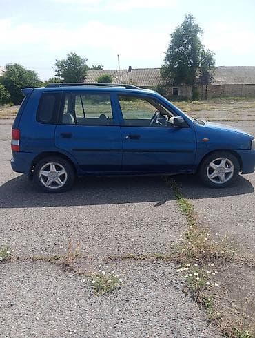 нарди руль: Mazda Demio: 1998 г., 1.3 л, Механика, Бензин, Хэтчбэк — 3