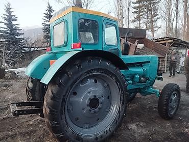 авто краан: Трактор колесный, кабина закрытого типа, окрас бирюзовый. Особенности — 4