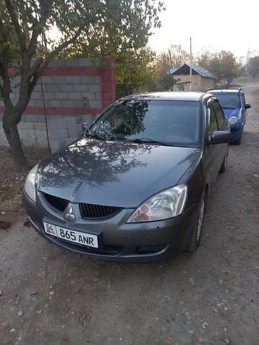 Mitsubishi Lancer: 2004 г., 1.6 л, Механика, Бензин, Седан