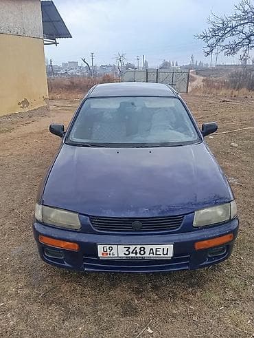 Mazda 323: 1996 г., 1.5 л, Механика, Бензин, Седан