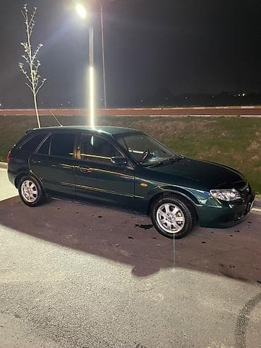 Mazda 323: 2002 г., 1.6 л, Механика, Бензин, Универсал