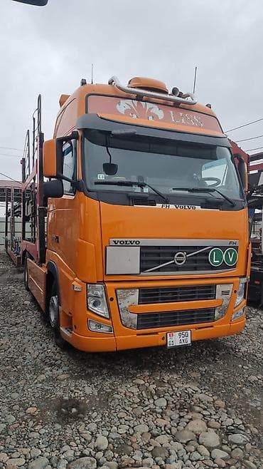 атего 1224: Тягач, Volvo, 2011 г., Автовоз — 1