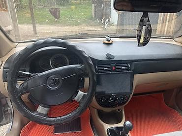один: Chevrolet Lacetti: 2004 г., 1.6 л, Механика, Газ, Седан — 10
