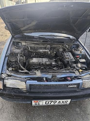 Продажа авто: Mazda 323: 1990 г., 1.5 л, Механика, Бензин, Седан — 8