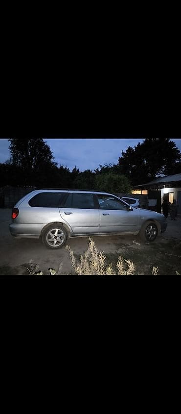 5: Nissan Almera Tino: 2001 г., Механика, Бензин, Универсал — 5