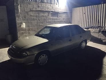 Унаа сатуу: Daewoo Nexia: 2011 г., 1.5 л, Кол менен иштөөчү, Бензин, Седан — 3