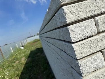 Кладка стен из облицовочного кирпича и декоративного камня -