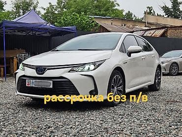 Toyota Corolla: 2022 г., 1.8 л, Автомат, Гибрид, Седан