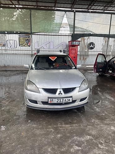 мицубиси кольт купить: Mitsubishi Lancer: 2003 г., 1.6 л, Ручные, Газ, Универсал — 5