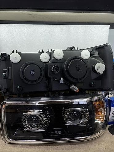 zimmer e9 pro: Комплект передних фар DAF 2012 г., Новый, Оригинал, Китай — 2