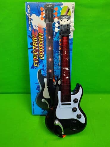 Паркет: Гитара игрушка музыкальная🎸 Комплектация товара: гитара, 3 батарейки✅ — 1