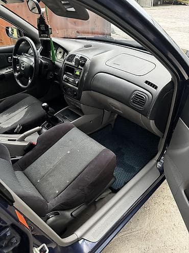 разбор демио: Mazda 323: 2002 г., 1.6 л, Механика, Бензин, Универсал — 9