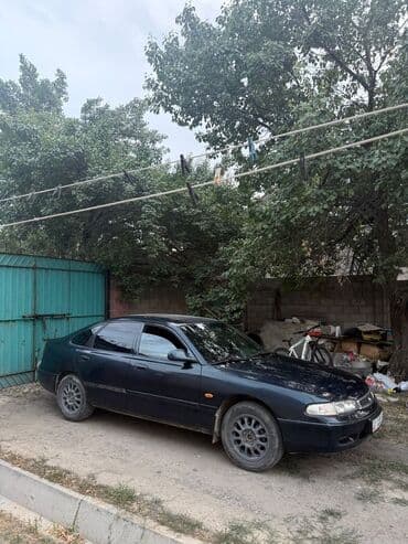 выкуп машина берилет: Mazda 626: 1995 г., 1.8 л, Механика, Бензин, Хетчбек — 3