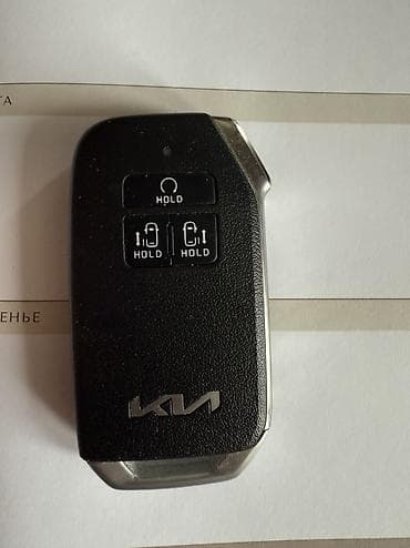 Автозапчасти: Продаю ключ для KIA Carnival 3г с кожанным чехлом 
цена 12000 сом — 1